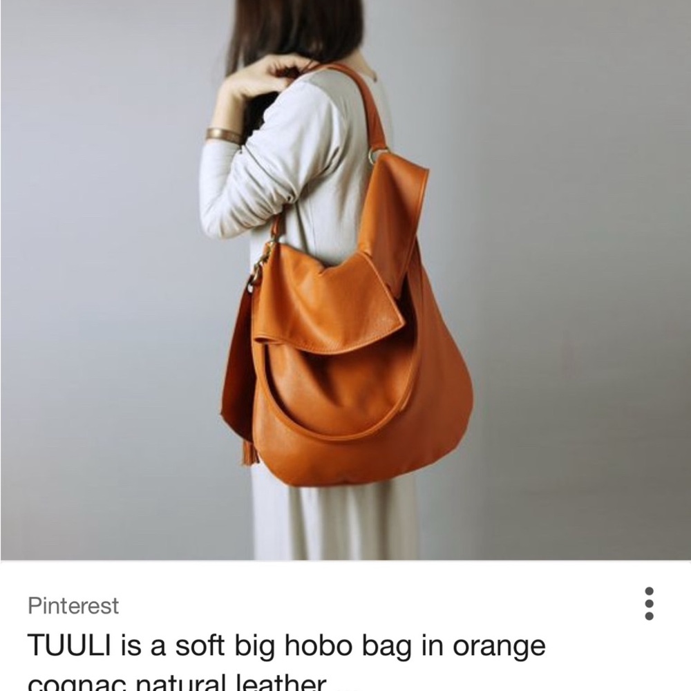 Vibrant Orange Leather Hobo Bag with Slouchy Design